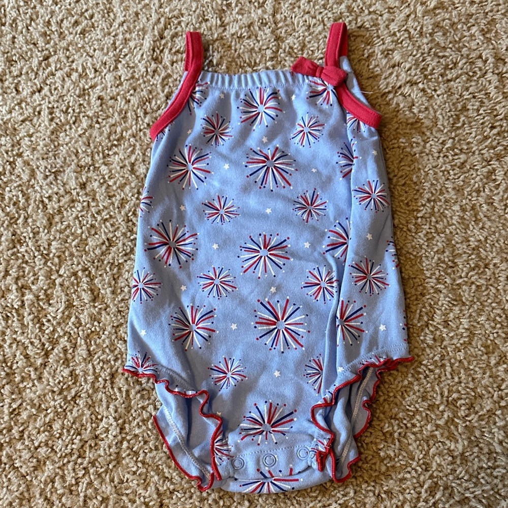 Blue Baby Romper with Red and White Starburst Pattern